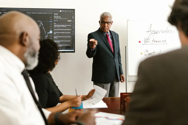 Carrying the Team: How High Performers Become Unpaid Coaches—and What It Costs Them